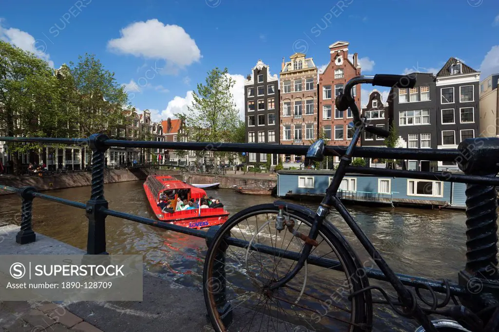 Herengracht with gabled houses and sightseeing boat, Amsterdam, North Holland, Netherlands, Europe