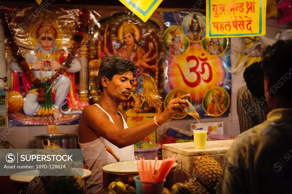 Hindu fruit juice stall at local rural fair, Sejpur, Gujarat, India, Asia