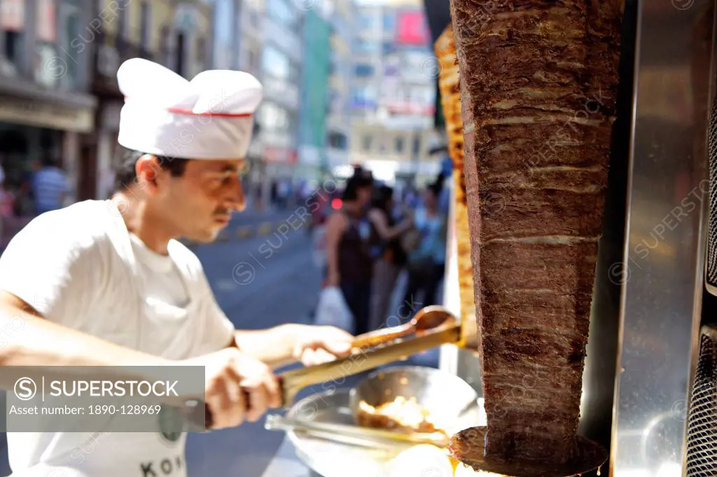 Chef cutting meat for kebab, Istanbul, Turkey, Eurasia