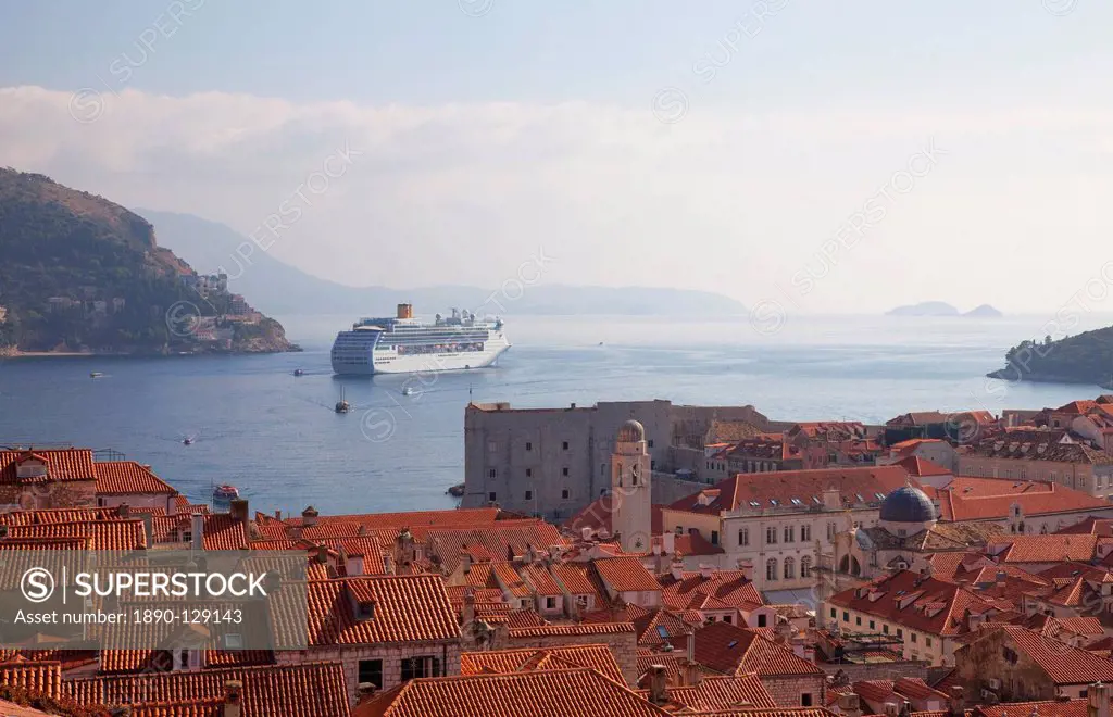 Rooftops, cruise ship and the island of Lokrum from Dubrovnik Old Town walls, Dubrovnik, Croatia, Europe
