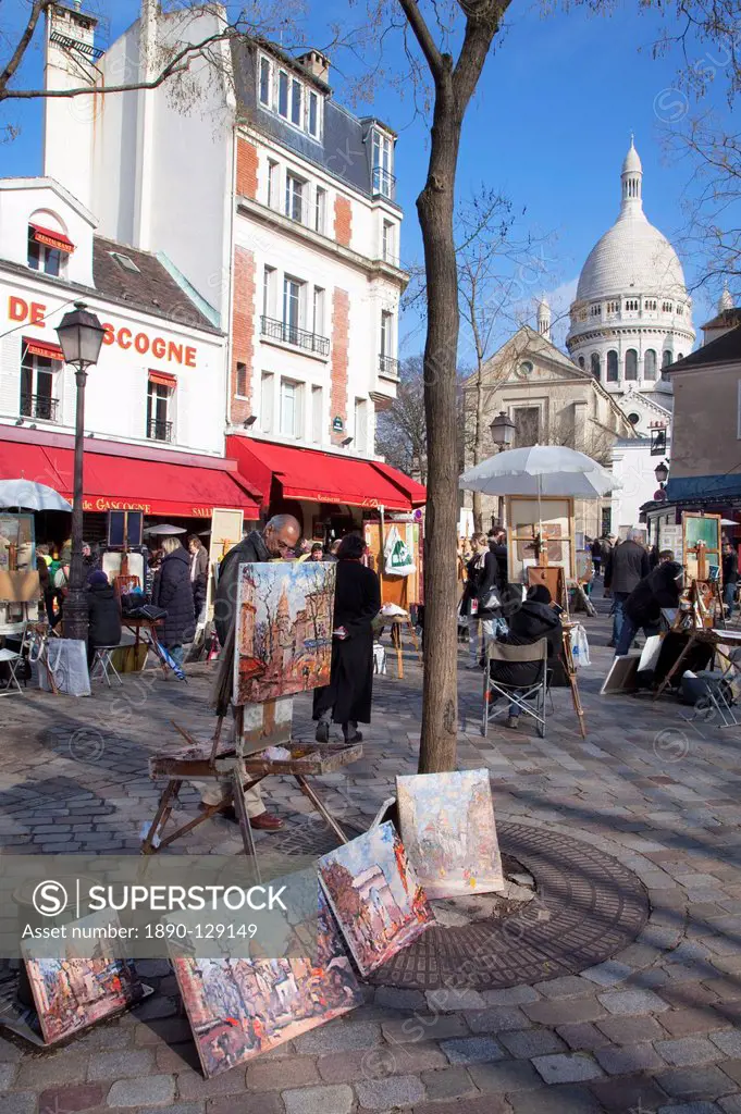 Paintings for sale in the Place du Tertre with Sacre Coeur Basilica in distance, Montmartre, Paris, France, Europe