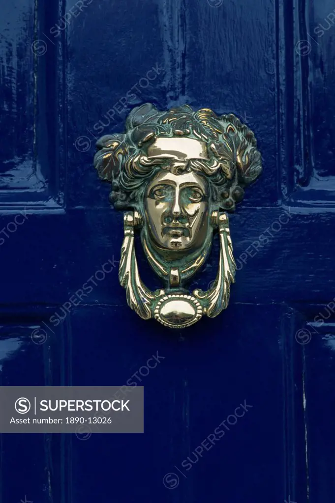 Blue painted door and knocker in the centre of the city of Dublin, Eire, Europe