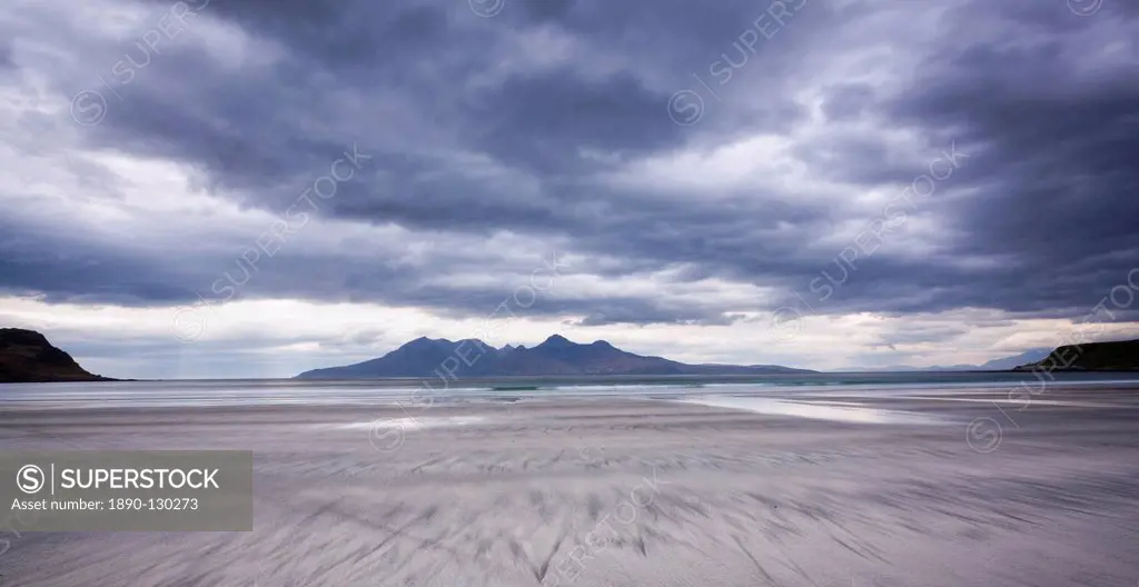 Early evening view towards Rum from the Bay of Laig on Eigg, Inner Hebrides, Scotland, United Kingdom, Europe