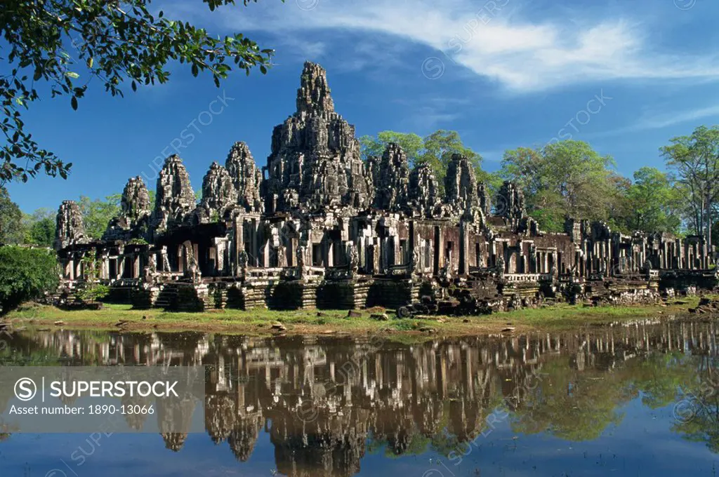 The Bayon Temple reflected in water at Angkor, UNESCO World Heritage Site, Siem Reap, Cambodia, Indochina, Southeast Asia, Asia