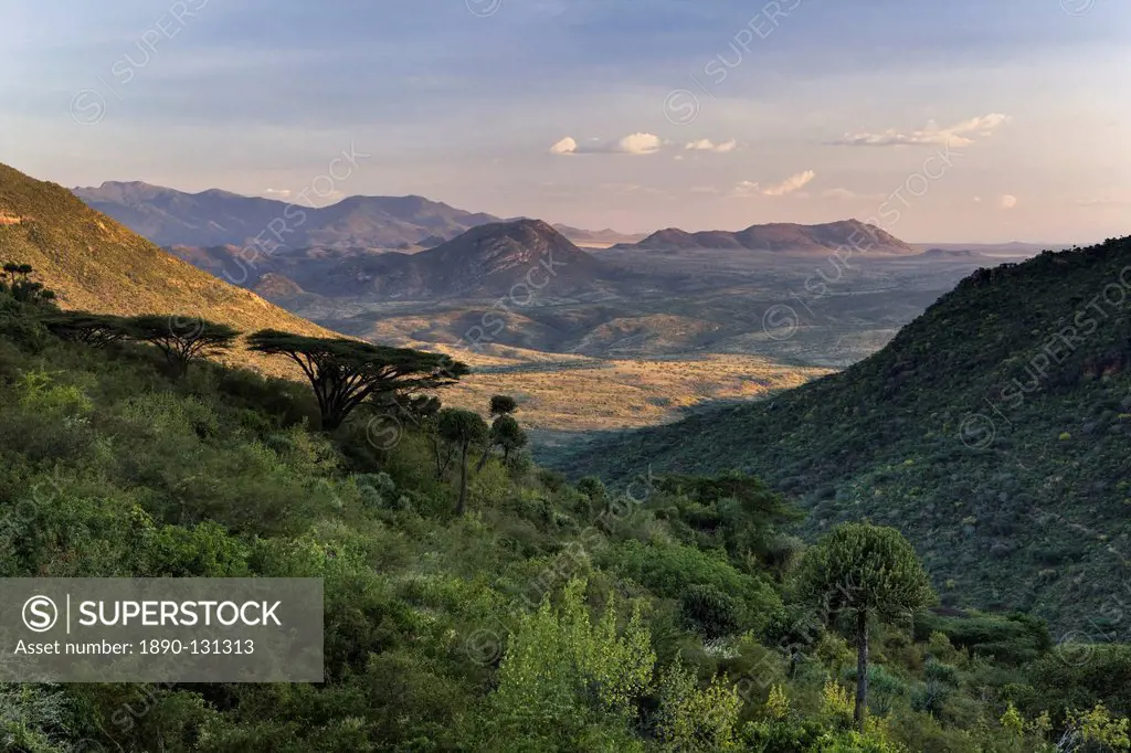 Looking down over the Ewaso Rongai Valley from the southern slopes of Mount Nyiru just before sunset, Northern Frontier, Kenya, East Africa, Africa
