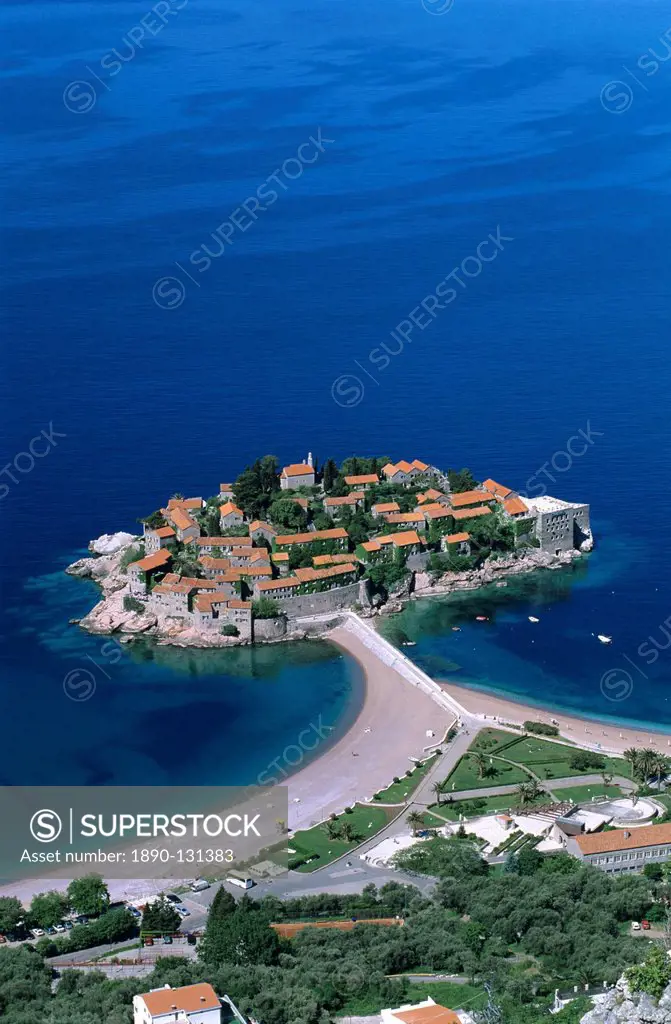 Aerial view over island and sandbar, Sveti Stefan, The Budva Riviera, Montenegro, Europe