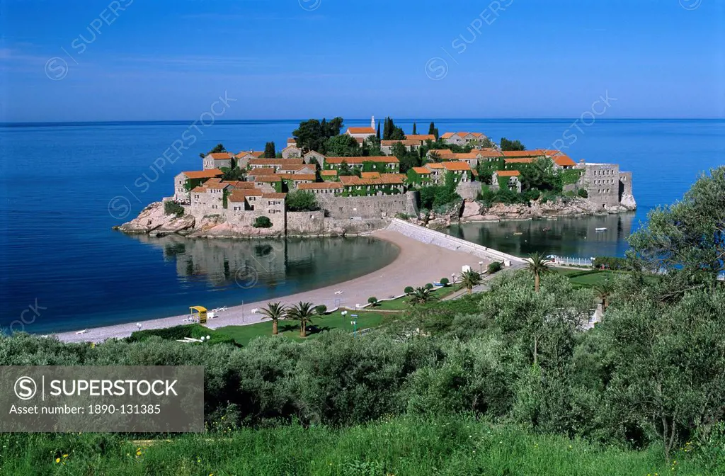 View of island and beach, Sveti Stefan, The Budva Riviera, Montenegro, Europe