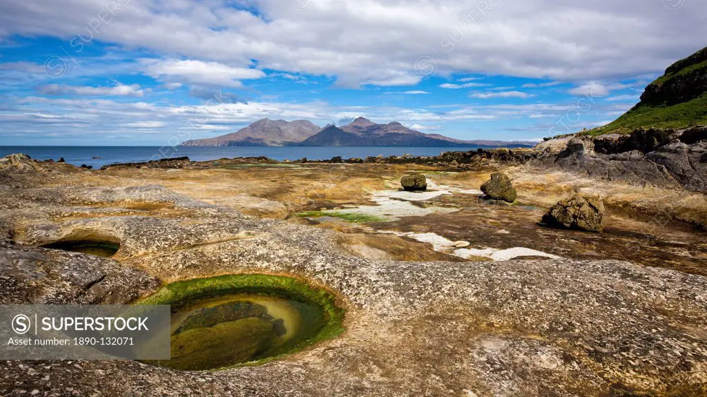 Looking towards Rum from the rock formations beyond Laig Bay, Isle of Eigg, Inner Hebrides, Scotland, United Kingdom, Europe