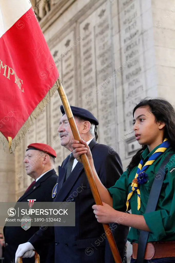 French Muslim girl scout and war veterans at the Arc de Triomphe, Paris, France, Europe