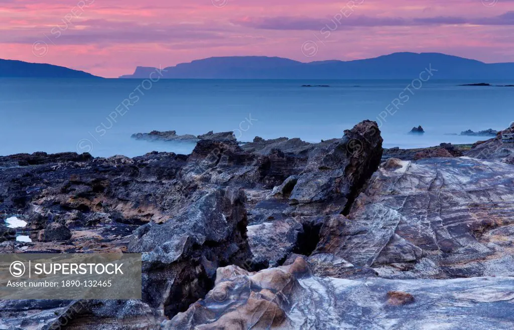 Sunset over Skye from the Isle of Eigg, Inner Hebrides, Scotland, United Kingdom, Europe