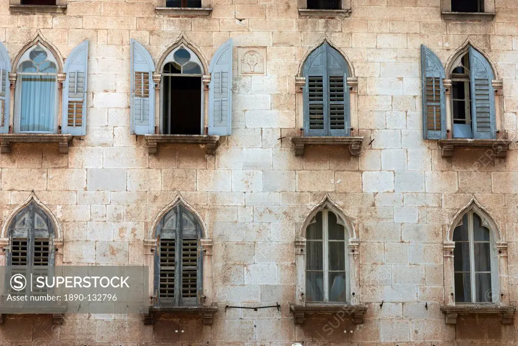 Window arches in old town, Porec, Istria, Croatia, Europe