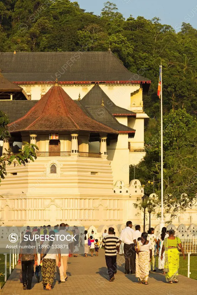 The Temple of the Sacred Tooth Relic Temple of the Tooth at sunset, a major tourist attraction and site of Buddhist pilgrimage, UNESCO World Heritage ...