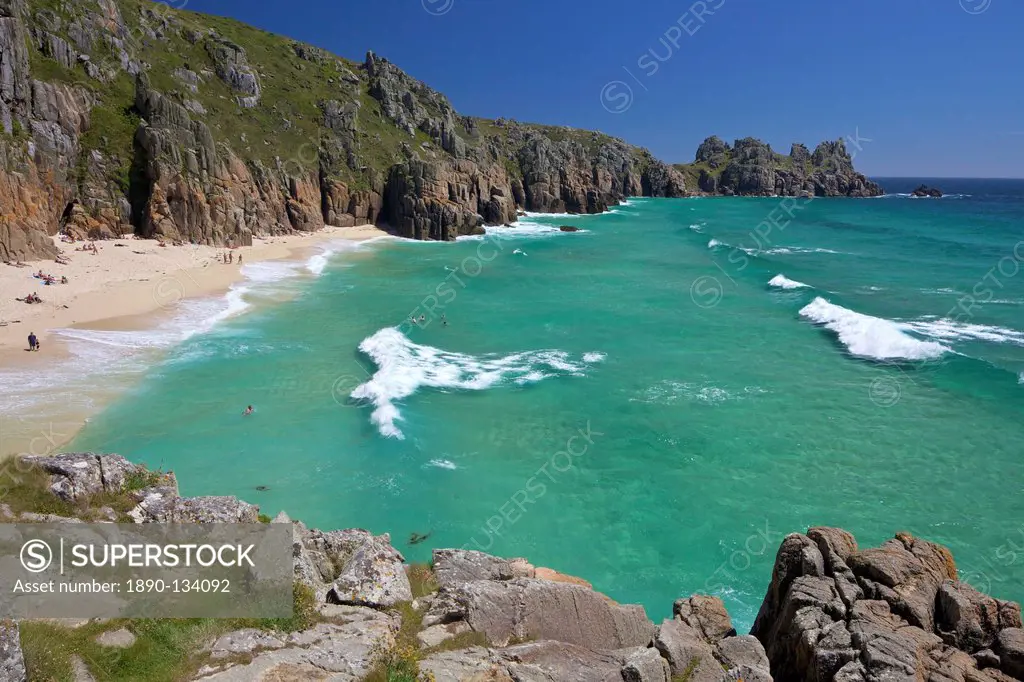 Surf and turquoise sea at Pednvounder beach in summer sunshine, Treen Cliff, near Porthcurno, Lands End Peninsula, West Penwith, Cornwall, England, Un...