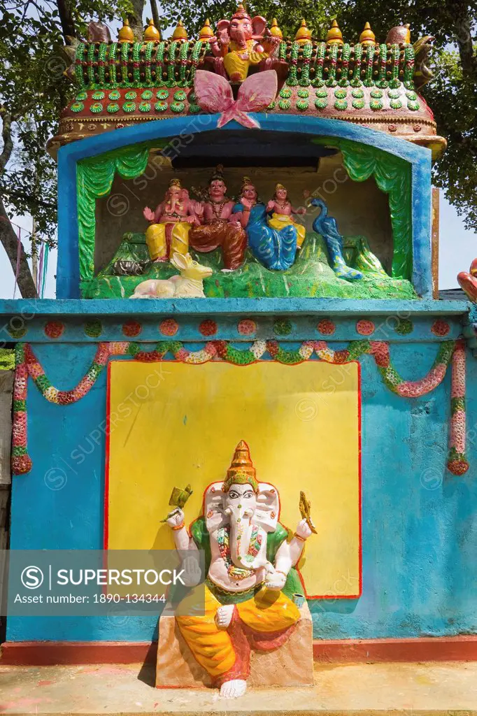 Hindu temple to elephant headed deity Ganesh and his family above, Shiva and Parvati with sons Ganesh and Muruga, near Ella, Sri Lanka, Asia