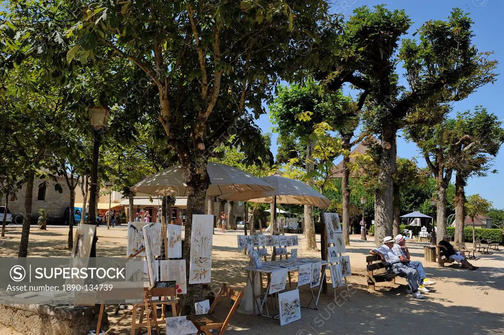 Artist´s stall in a tree lined promenade, Bastide town, Domme, Les Plus Beaux Villages de France, Dordogne, France, Europe