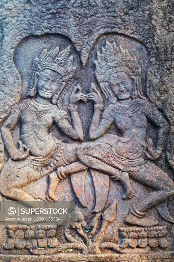 Close_up of sculpture of apsara holy dancers, Bayon temple, dating from the 13th century, Angkor, UNESCO World Heritage Site, Siem Reap, Cambodia, Ind...