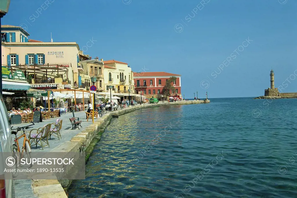 The harbour waterfront and the Venetian lighthouse, Chania, Crete, Greece, Europe