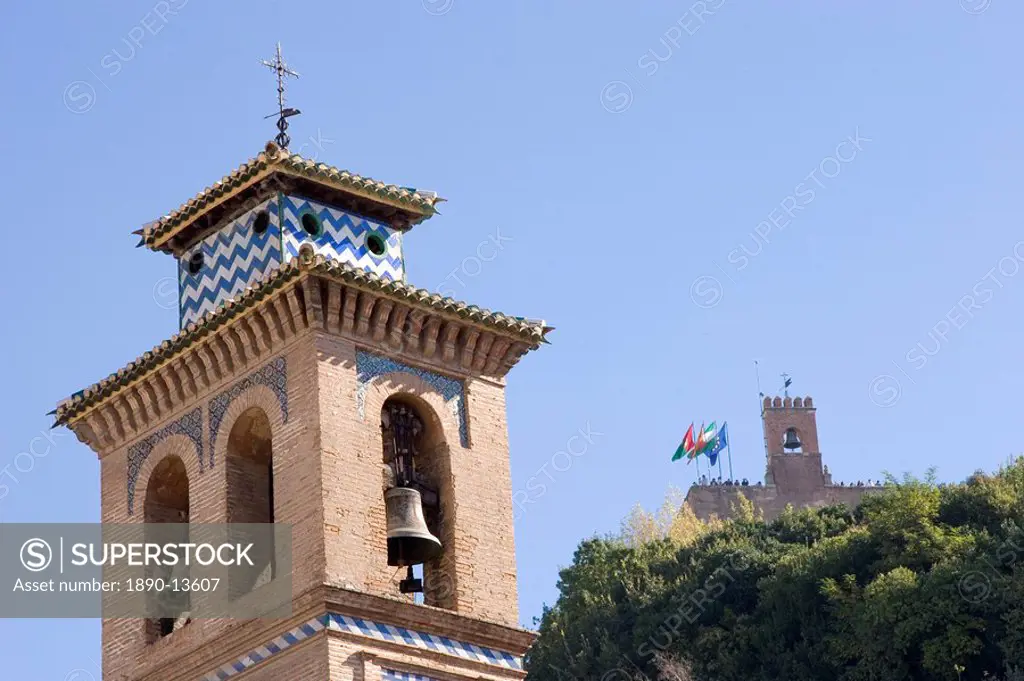 Bell tower of Santa Anna church with the watch tower of the Alcazaba in the background, Granada, Andalucia, Spain, Europe