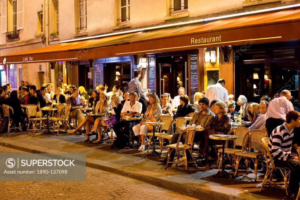 Cafe scene at night, Paris, France, Europe