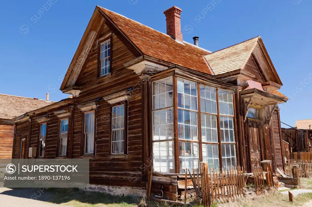 Glass fronted house of J S Cain the principal property owner in the California gold mining ghost town, Green Street, Bodie State Historic Park, Bodie,...