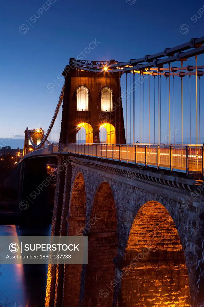Evening illuminations on the Menai Bridge spanning the Menai Strait, North Wales, Wales, United Kingdom, Europe