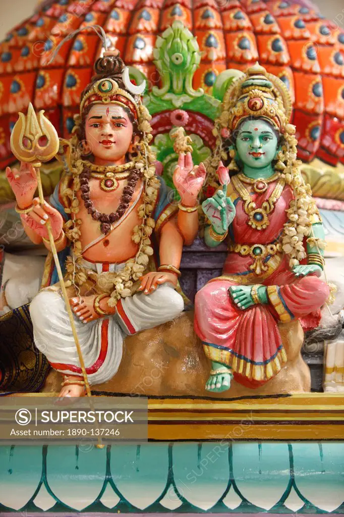Close_up of Shiva and Parvati statues in Hindu temple, France, Europe