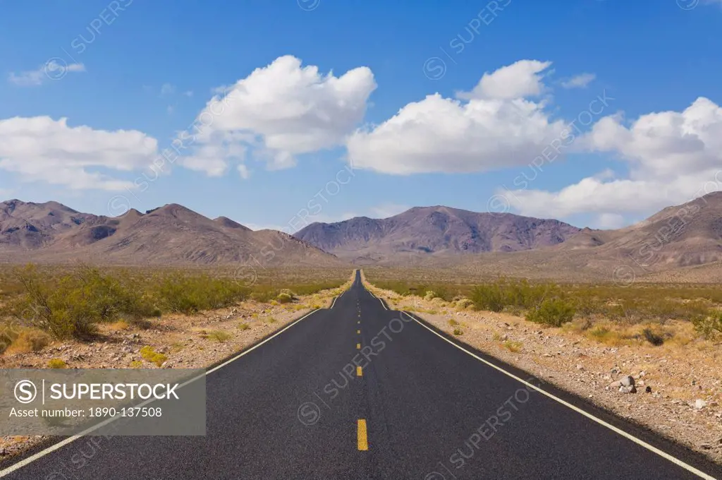 Straight road, Daylight Pass road, Highway 374 from Beatty Nevada, through the Grapevine mountains of the Amargosa Range to Death Valley, with Mesquit...