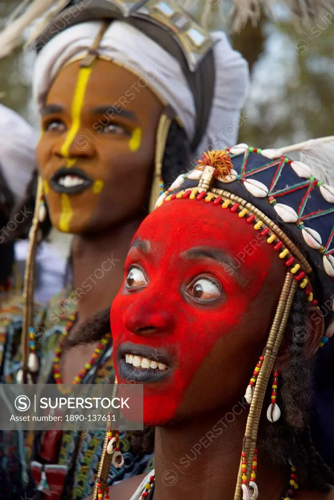 Wodaabe Bororo man with his face painted at the annual Gerewol male beauty contest, a general reunion of West African Wodaabe Peuls Bororo Peul, Niger...