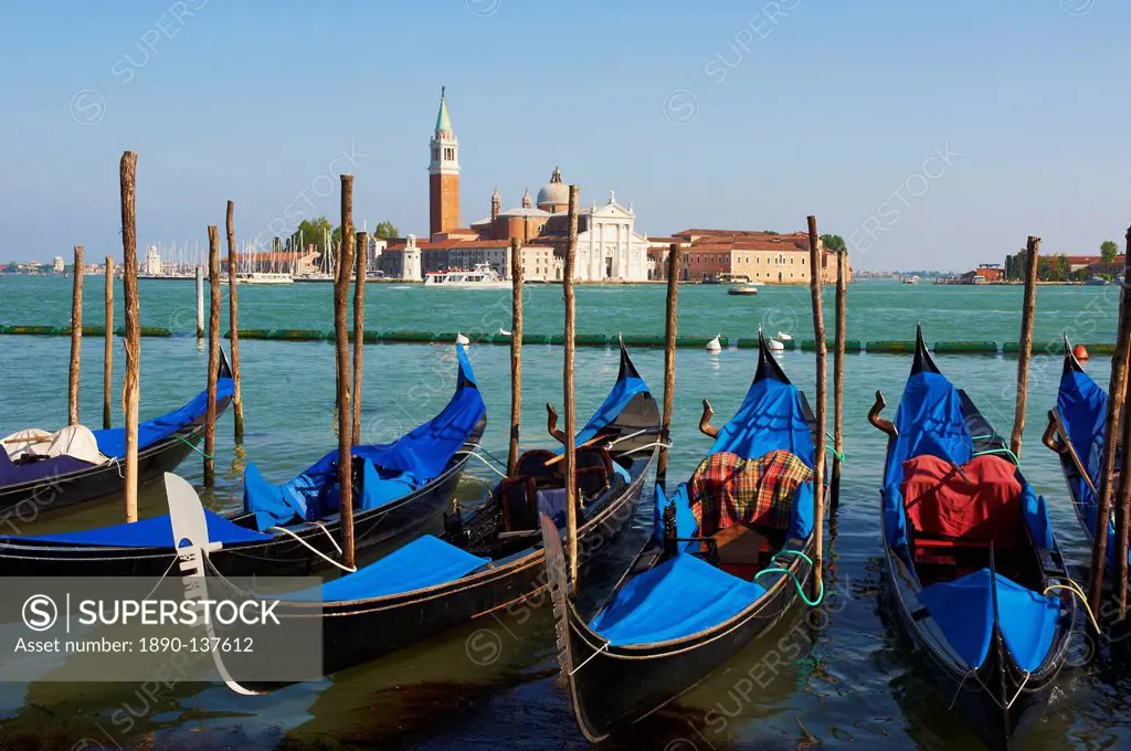 Gondolas and the island of San Giorgio Maggiore, Venice, UNESCO World Heritage Site, Veneto, Italy, Europe