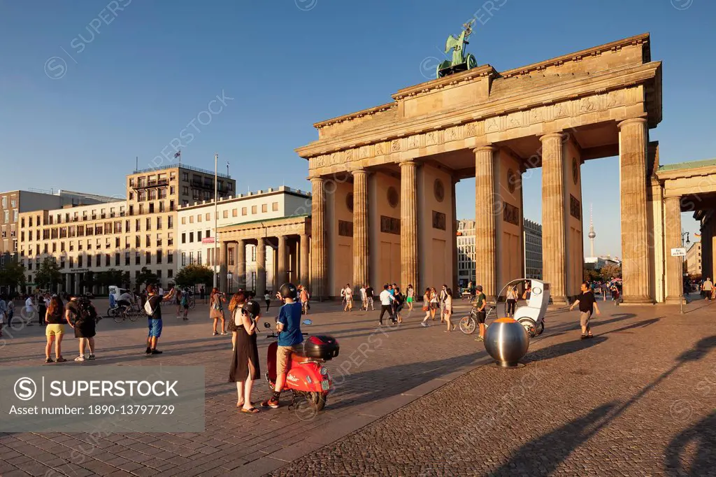 Brandenburg Gate (Brandenburger Tor) at sunset, Platz des 18 Marz, TV Tower, Berlin Mitte, Berlin, Germany, Europe