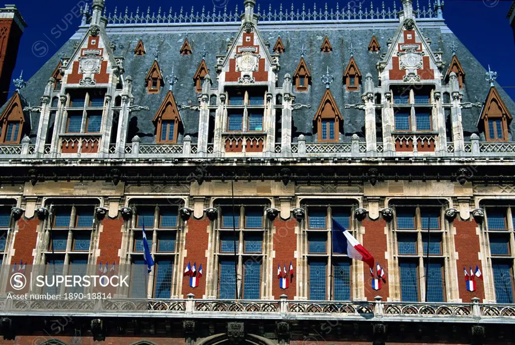 Detail of windows, dormers and flags on the town hall in Calais, Nord Pas de Calais, France, Europe