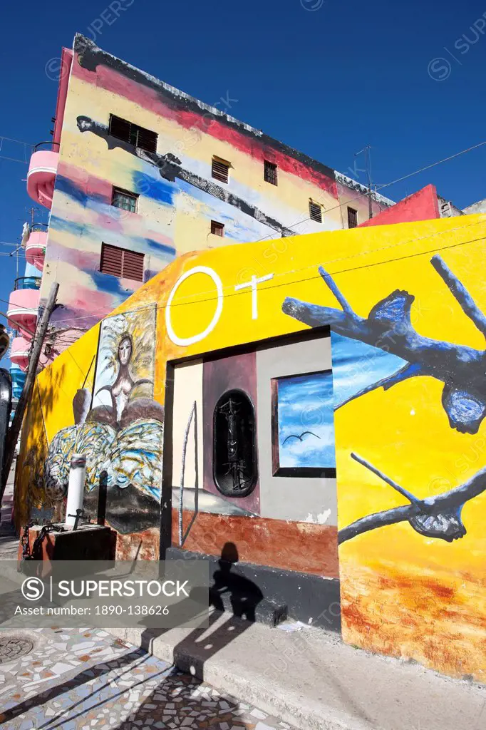 Buildings painted in colourful Afro_Cuban art, masterminded by artist Salvador Gonzalez Escalona, Callejon de Hamel, Havana, Cuba, West Indies, Centra...