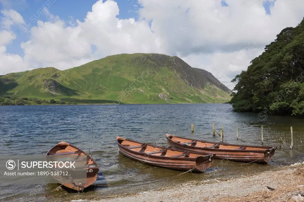 Fishermen´s boats on Crummock Water, Lingmell Fell in background, Lake District National Park, Cumbria, England, United Kingdom, Europe