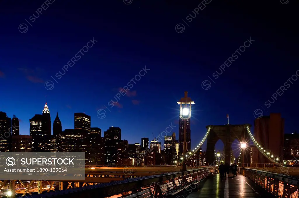 The Brooklyn Bridge and New York City skyline at dusk, New York City, New York State, United States of America, North America