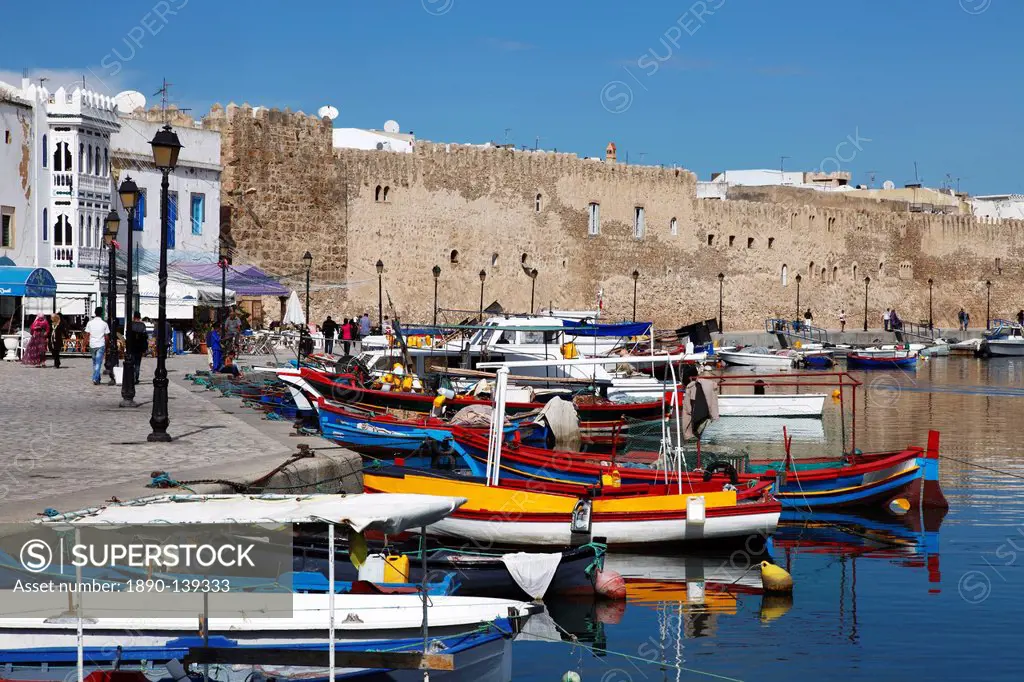 Old Port Canal, fishing boats and wall of the Kasbah, Bizerte, Tunisia, North Africa, Africa
