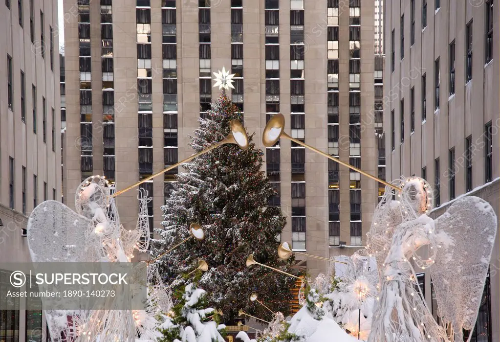 The Christmas tree and decorations under fresh snow in Rockefeller Center, New York City, New York State, United States of America, North America