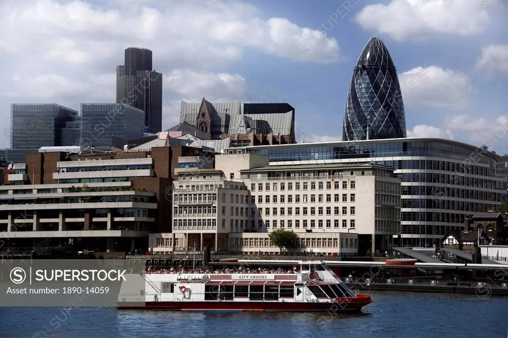 View across the River Thames to the City of London, with the Gherkin Swiss Re Building and Natwest Tower on skyline, London, England, United Kingdom, ...