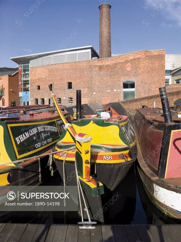 Narrow boats and barges moored at Gas Street Canal Basin, city centre, Birmingham, Midlands, England, United Kingdom, Europe