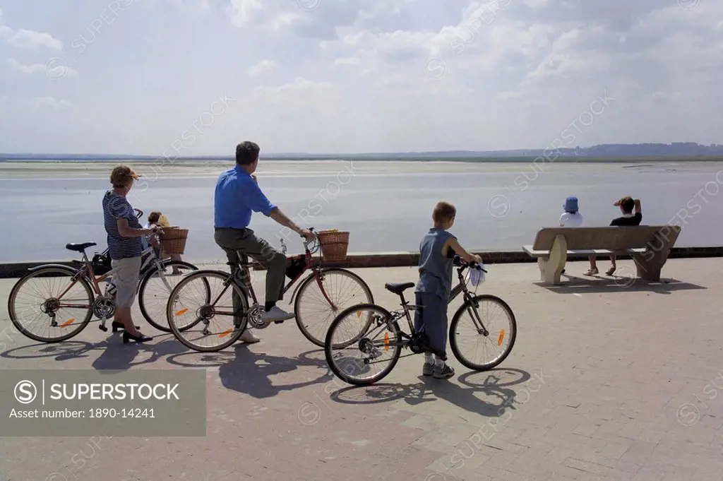 Family on bicycles, Le Crotoy, Somme Estuary, Picardy, France, Europe