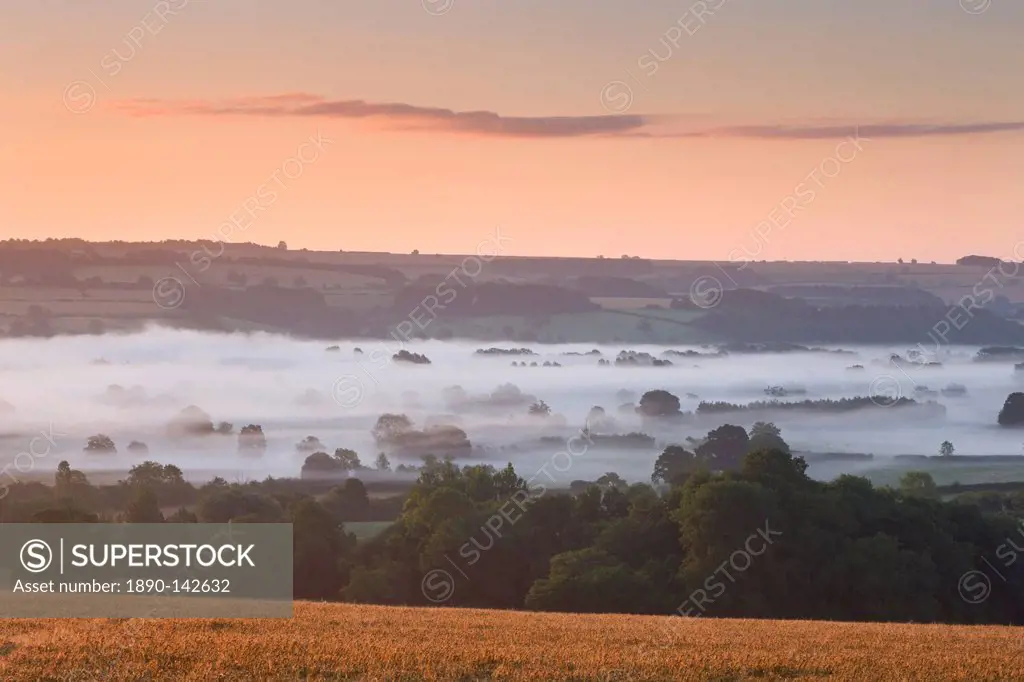 Mist covered Cotswolds countryside near Bourton on the Water, Gloucestershire, The Cotswolds, England, United Kingdom, Europe
