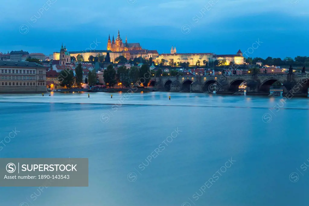 St. Vitus Cathedral, Charles Bridge, River Vltava and the Castle District illuminated at night, UNESCO World Heritage Site, Prague, Czech Republic, Eu...