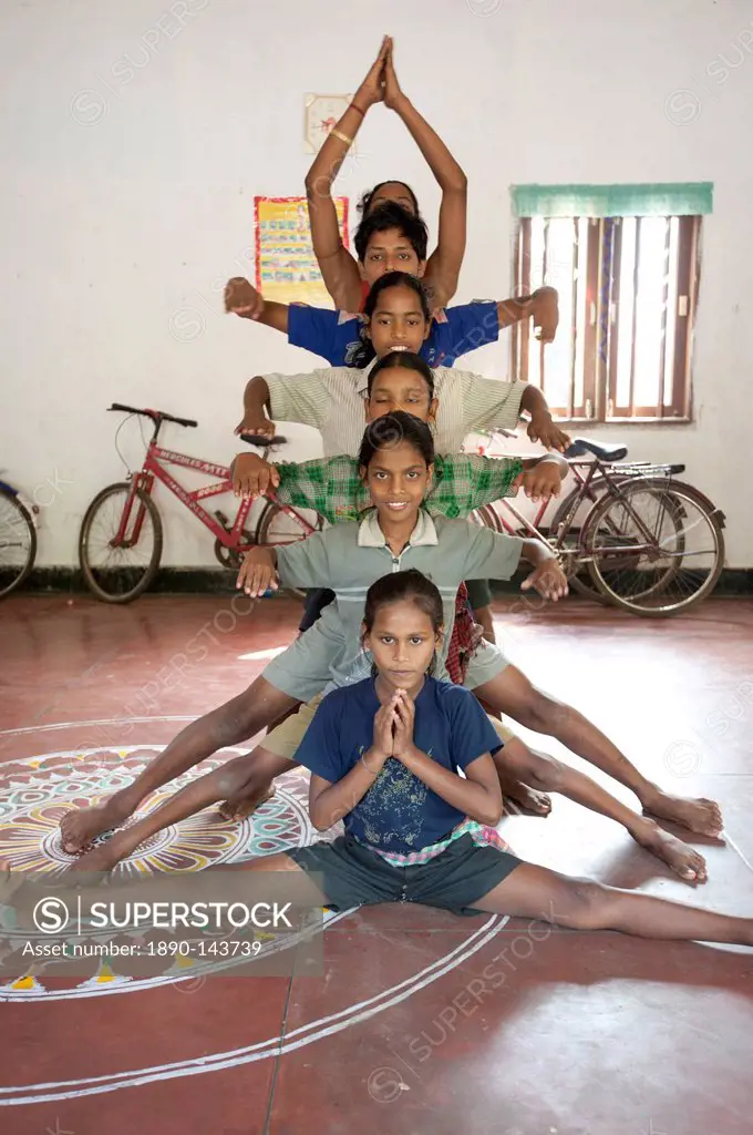 Young boys being trained as female Gotipua dancers performing in praise of Lord Jagannath and Lord Krishna, Raghurajpur, Orissa, India, Asia