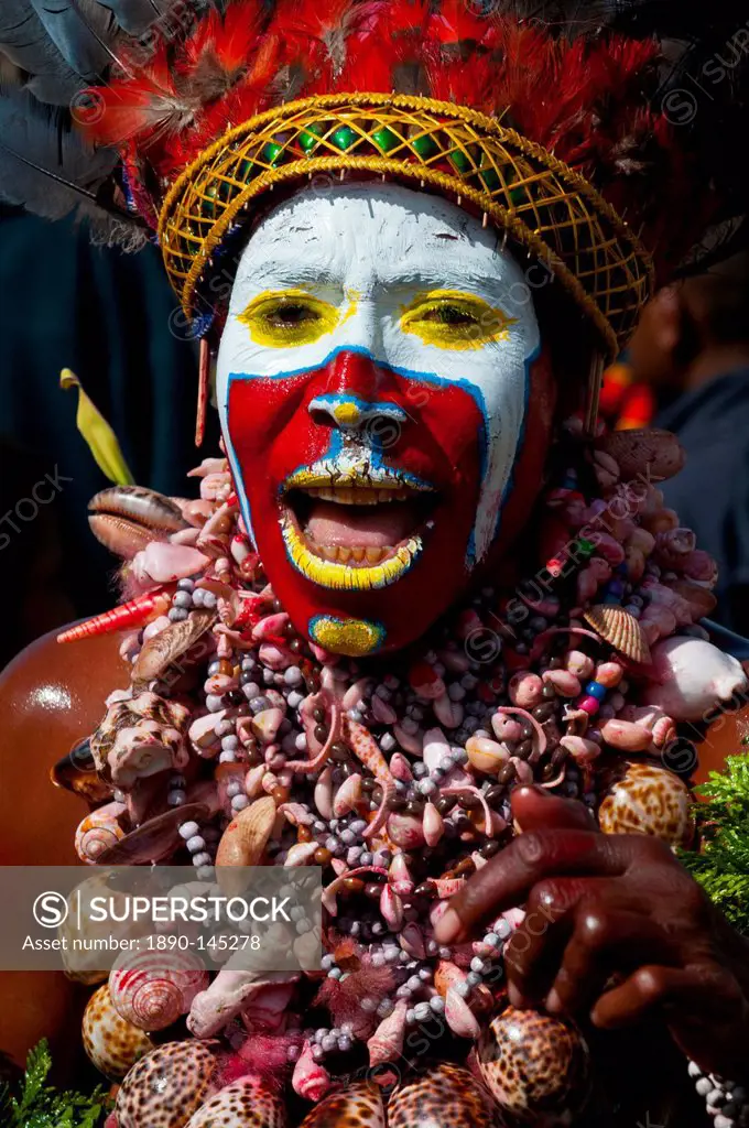 Colourfully dressed and face painted local tribes celebrating the traditional Sing Sing, Mount Hagen, Highlands of Papua New Guinea