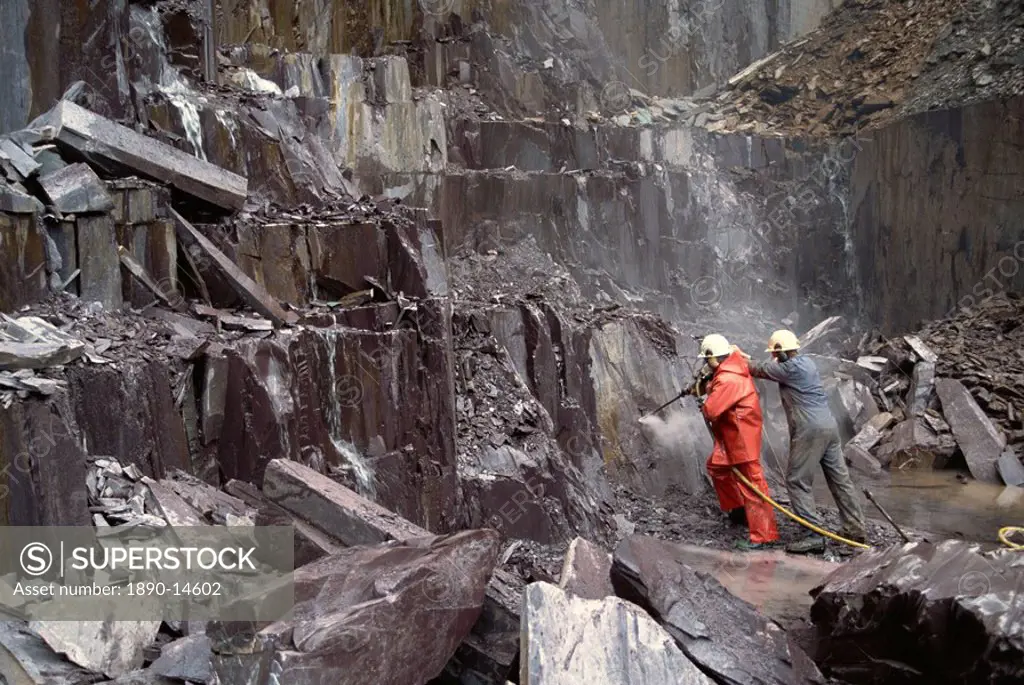 Pneumatic drilling of blast hole, Nantlle Slate Quarry, Snowdonia, north Wales, Wales, United Kingdom, Europe