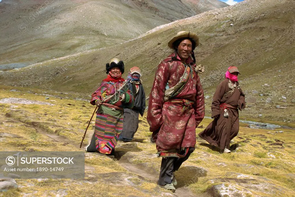 Tibetan Buddhist pilgrims on the kora, walking around Mount Kailas Mount Kailash, which is sacred to Buddhists and Hindus, Tibet, China, Asia
