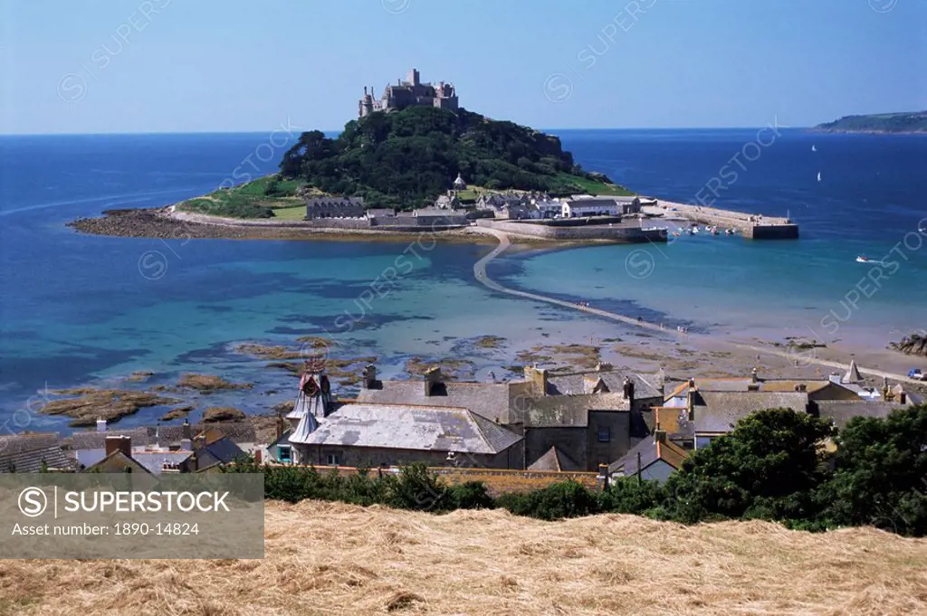 Submerged causeway at high tide, seen over rooftops of Marazion, St. Michael´s Mount, Cornwall, England, United Kingdom, Europe
