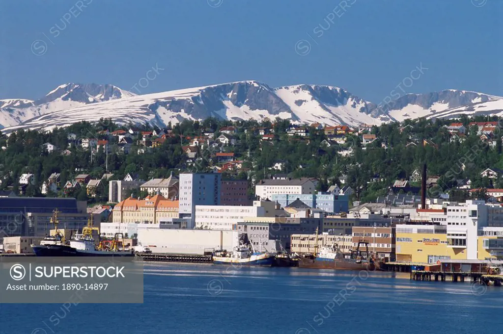 City known as Paris of the North, with snow on hills in June, Tromso, Norway, Scandinavia, Europe