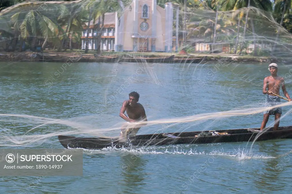 Fisherman casting his throw net in the coastal backwaters, Kerala, India, Asia