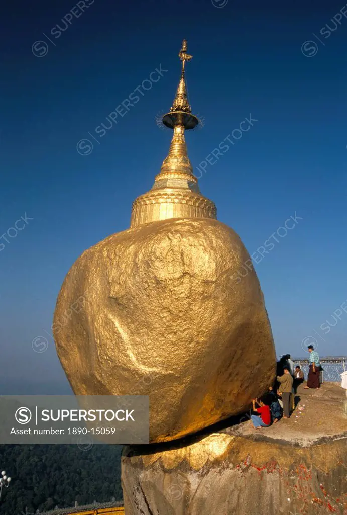 Balanced rock covered in gold leaf, major Buddhist stupa and pilgrim site, Kyaiktiyo, Myanmar Burma, Asia