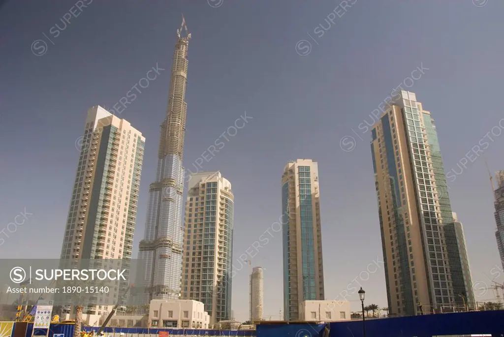 New high rise buildings inland from Jumeirah area, Burj Dubai, world´s tallest building under construction in background, Dubai Creek, Dubai, United A...